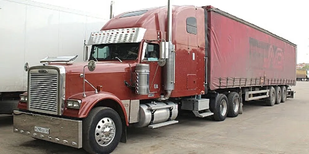 Обзор характеристик Freightliner FLD 132 — американский грузовик символ США — обложка обзора