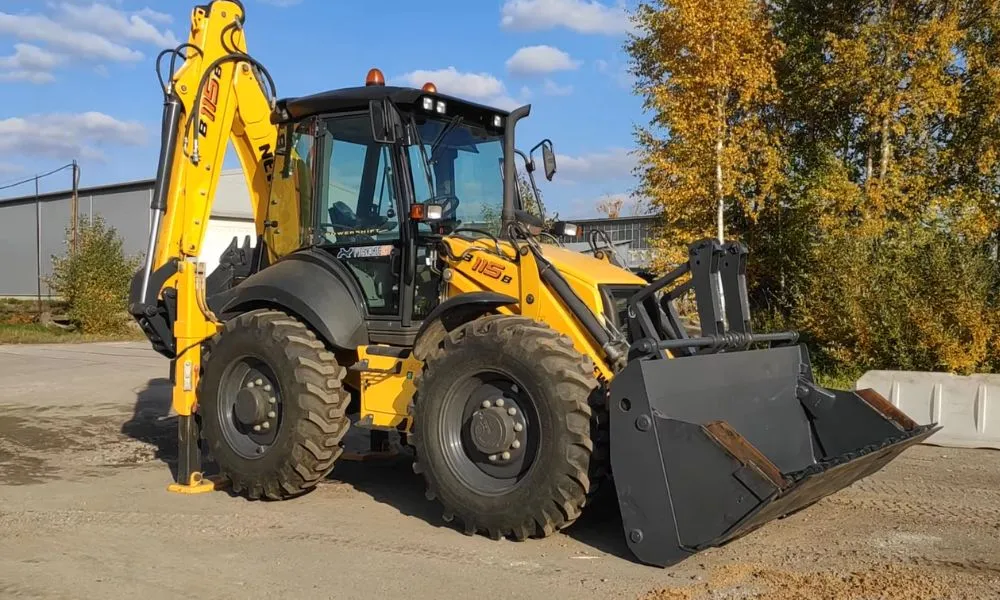 Погрузчик-экскаватор New Holland B115: внешний вид, техническая составляющая — обложка обзора